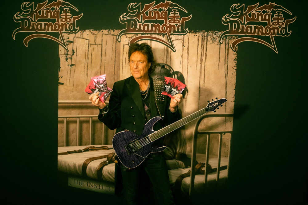 Andy La Rocque with his Ernie Ball strings endorsement